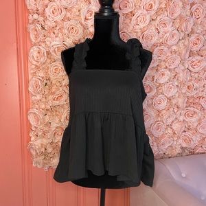 Black sleeveless ruffled shoulder tank top